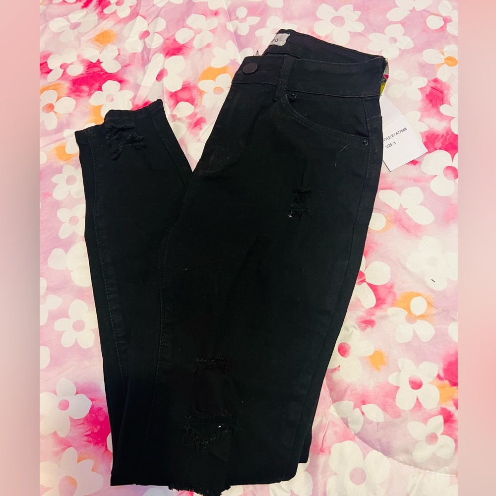 Black ripped jeans